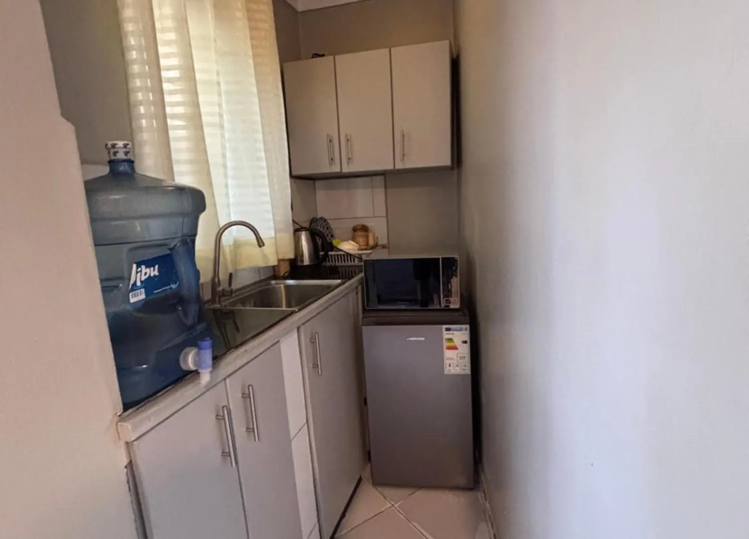 Glasgow Suites Кампала